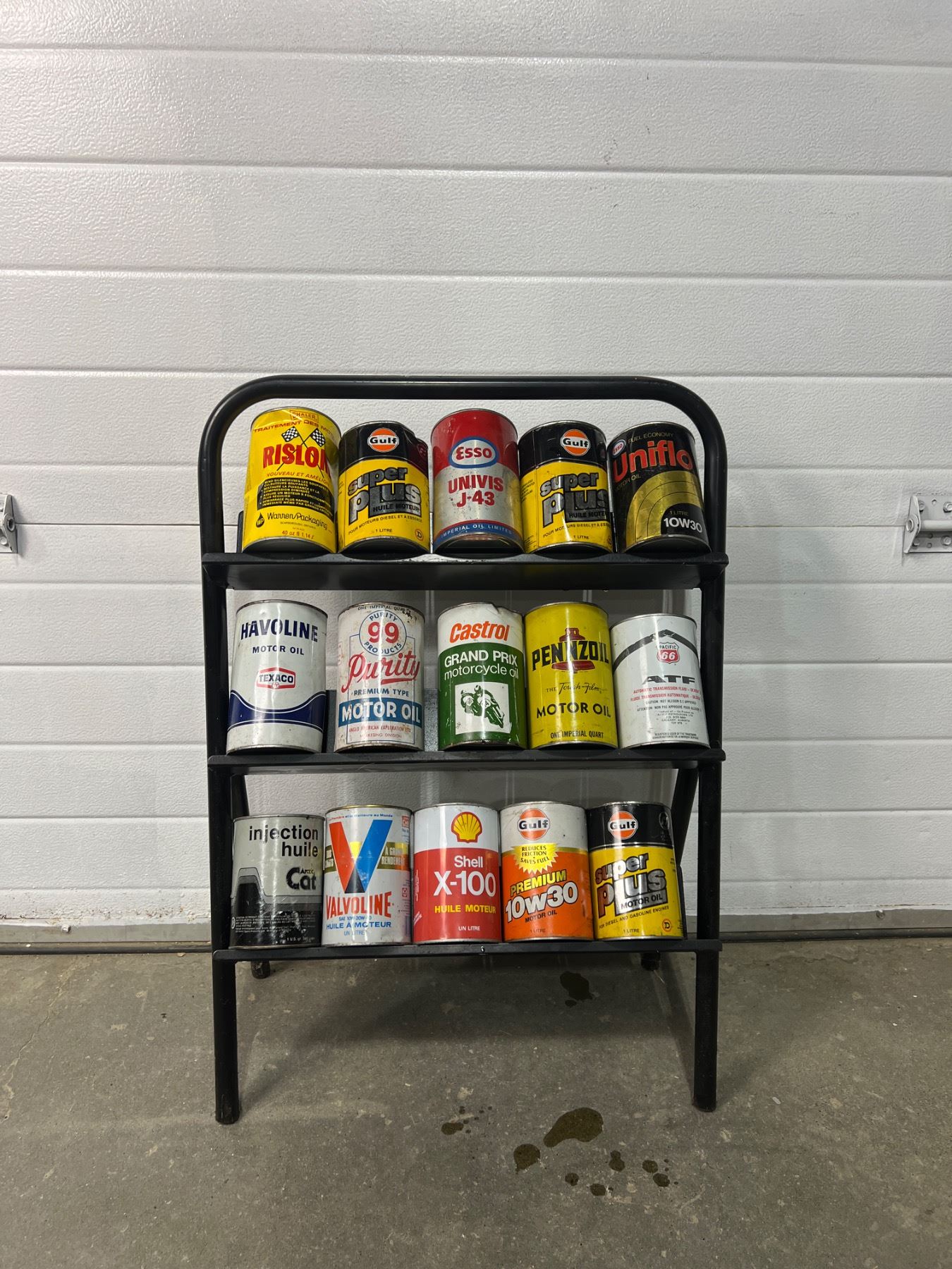 Motor Oil Rack & Cans - Sunrise Estate Services Ltd