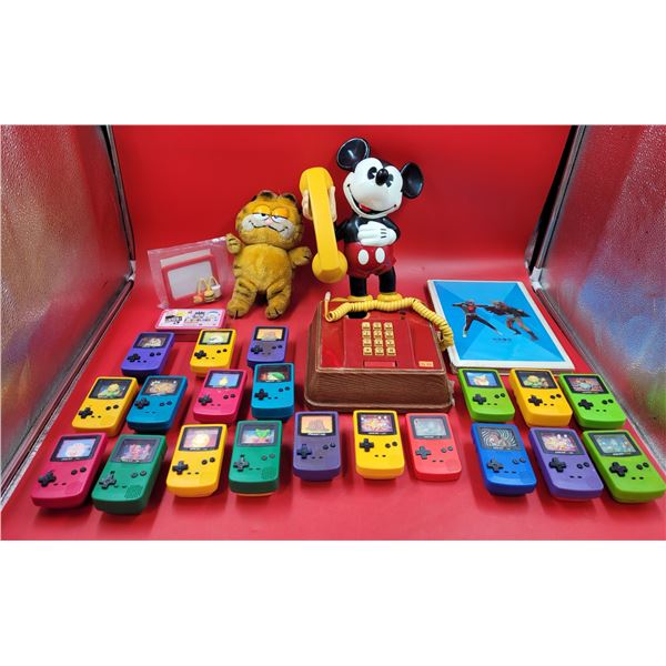 VTG Toy Lot w/ Mickey Mouse Telephone, Garfield Plush, Burger King x Pokémon x Gameboy Toys, & More