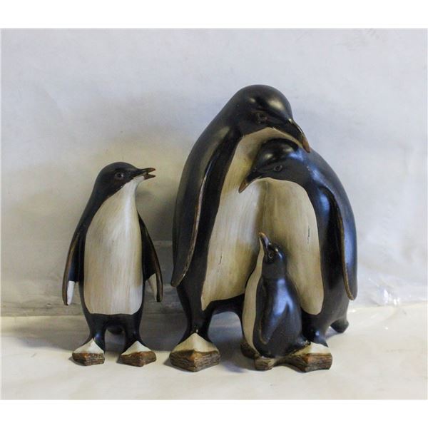 VINTAGE CARVED PENGUIN FAMILY FIGURINES