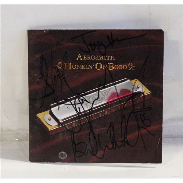 SIGNED AEROSMITH CD SLEEVE (NO COA)