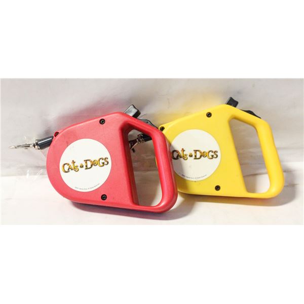 TWO RETRACTABLE 2001 CATS AND DOGS LEASHES