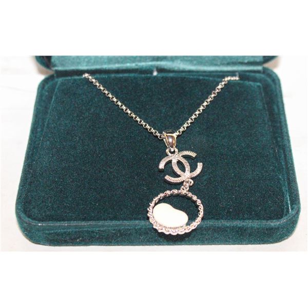 CHANEL SILVER WITH WHITE BEAN NEW