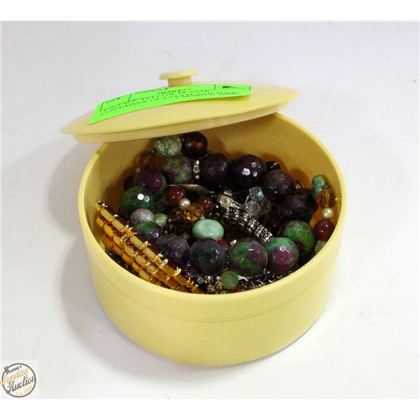 VINTAGE YELLOW PLASTIC CONTAINER OF ESTATE COSTUME