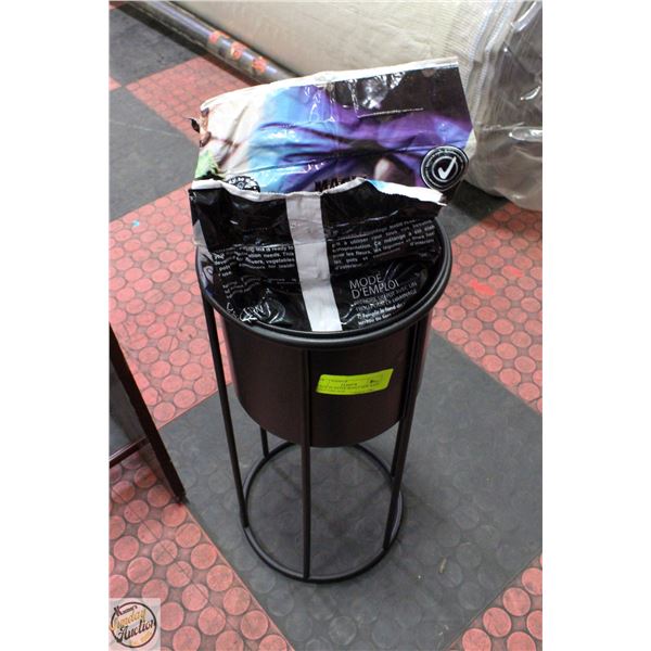 BLACK PLANTER WITH 3 NEW BAGS OF POTTING SOIL