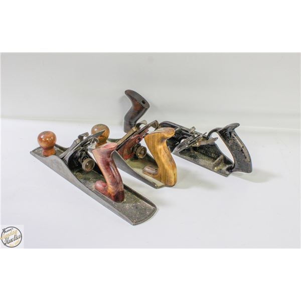 THREE LARGER HAND PLAINS