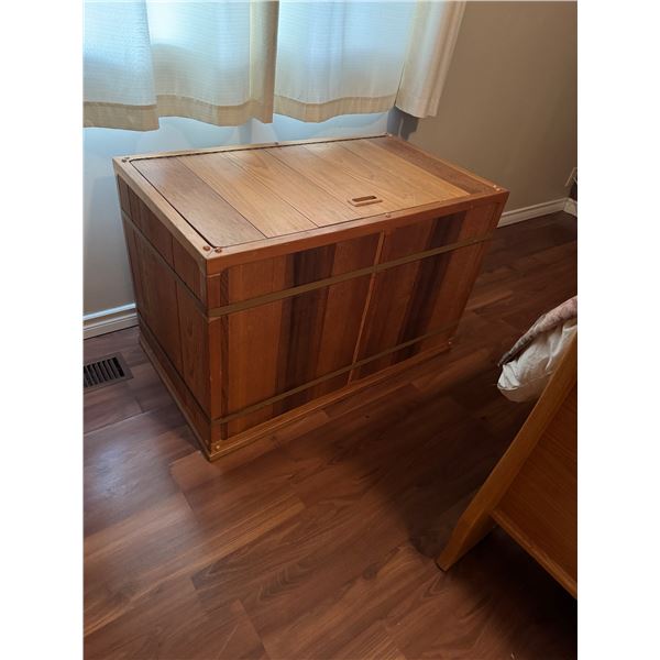 Wood chest measures 36 1/2" x 21" x 24" tall