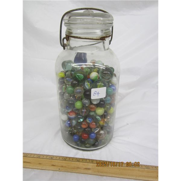 Large Glass Antique Sealer Full of Marbles