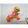 Image 2 : Lotof Toys Girl Riding Bike Necklace,2 Unused Containers of Silly Putty Circa 1970's