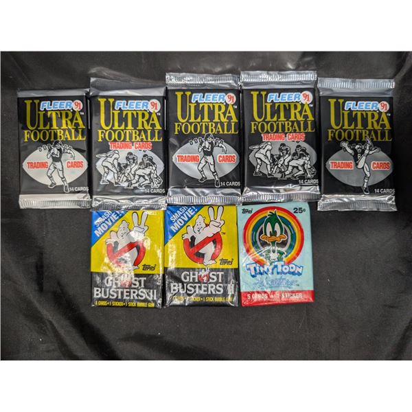(8) Unopened Packs of Fleer Ultra Football Topps Ghost Busters II + Tiny Toons Adventures 1994