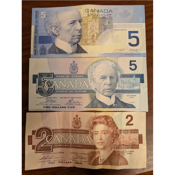 (3) Canadians Bills (2) 5 and 2 Dollar Bills and (1) 2002 5 Dollar Bill