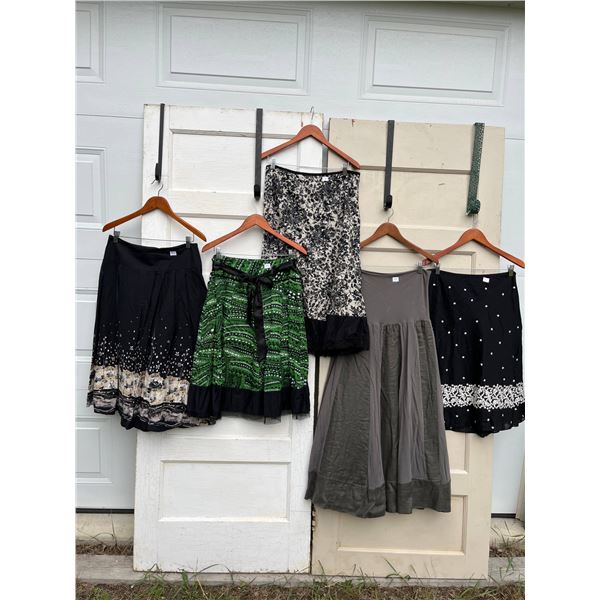 5 skirts sizes 12 - like new- 36"L