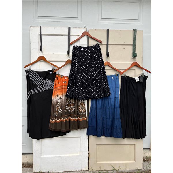 5 skirts sizes 8 - like new- 36"L