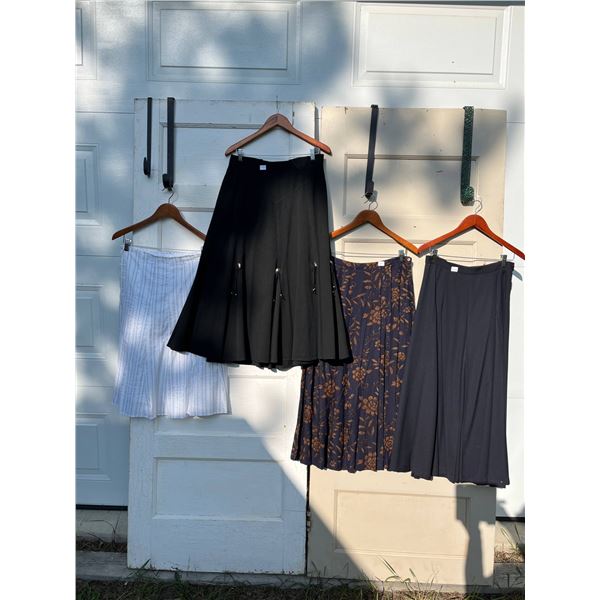4 skirts sizes 8/9- 34"L