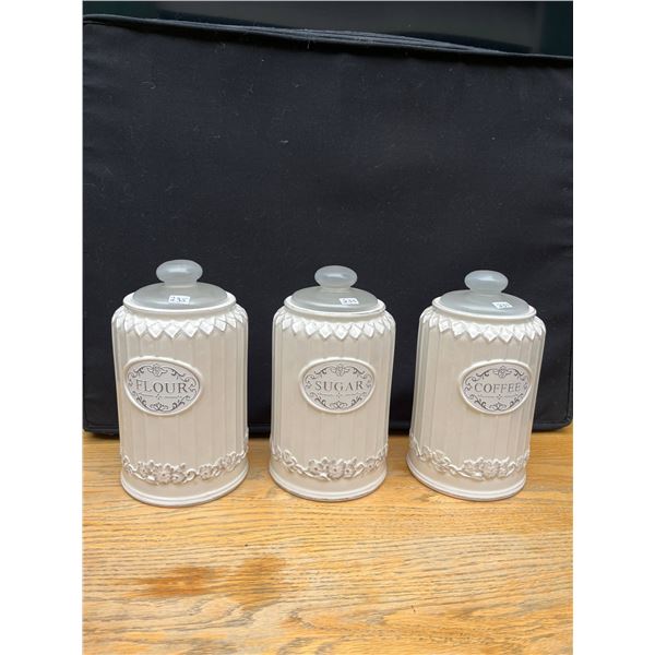 3 stoneware canisters- never used