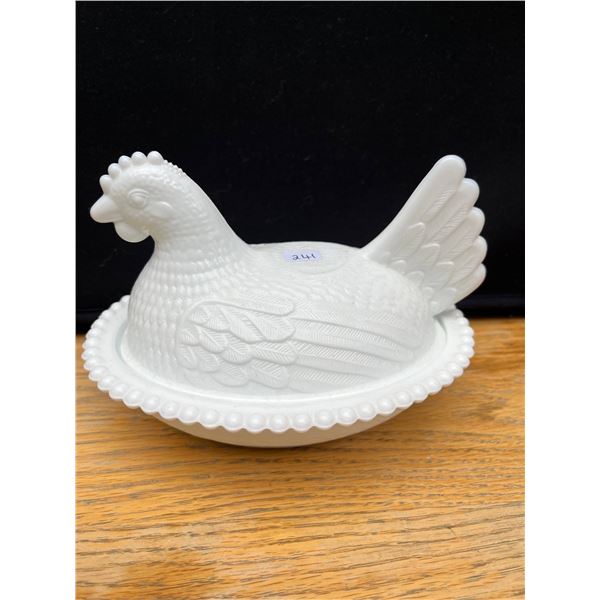 Vintage milk glass hen on a nest