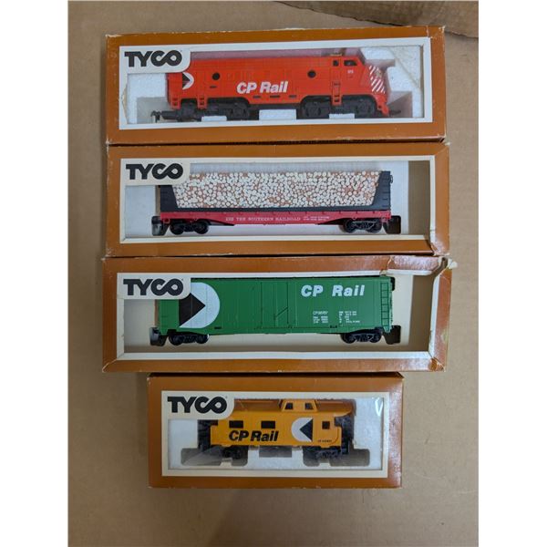 4 CP Tyco trains (1 engine, 3 rail cars)