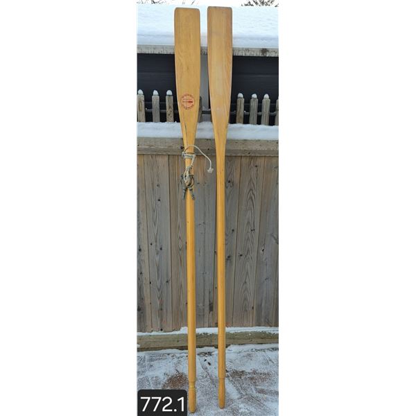 Pair of wooden oars with metal attachments, made in Quebec, excellent condition