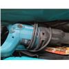 Image 4 : Electric Makita reciprocating saw with bag and blades