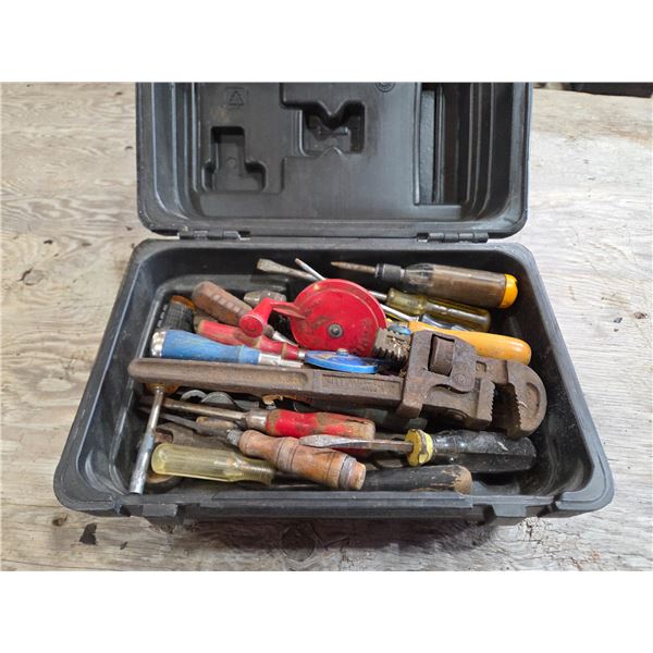 Several antique tools in a tool box