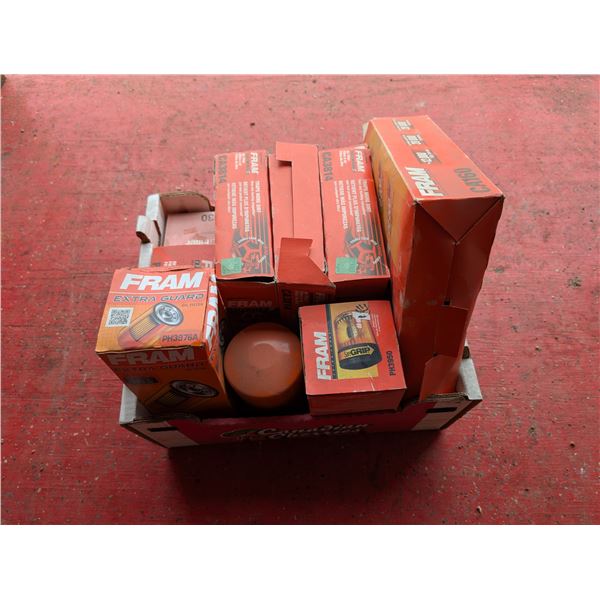 Box of FRAM Brand Oil Filters, Air Filters, and etc.