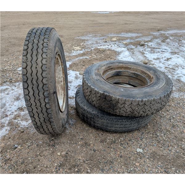 (3) Large Tires (2) Bridgestone 11.00R22 H 16 PR (1) TOYO 11R24.5 16 PR