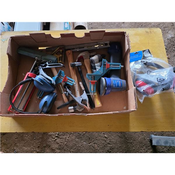 Assortment of tools and hardware