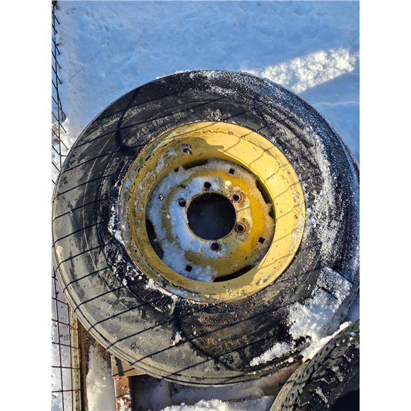 1 implement tire and rim for a tractor- 9.5L-15-SL