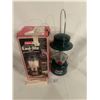 Coleman lantern #2000 - new in box, has black tar on edge of top