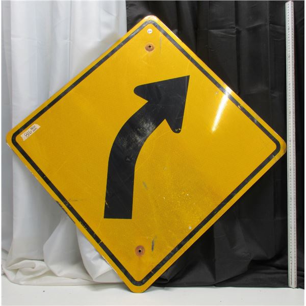 Slow Curve Ahead highway sign