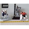 Image 1 : Hockey figures.
