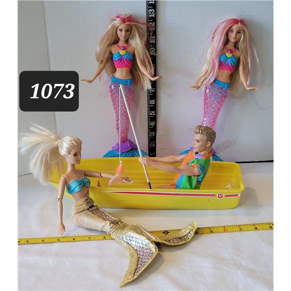 Barbies's Ken doll catching mermaids.