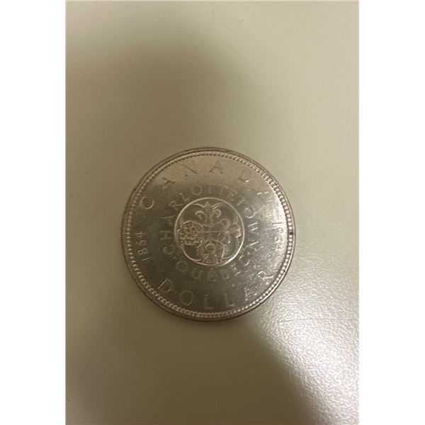 1864-1964 Canadian silver dollar