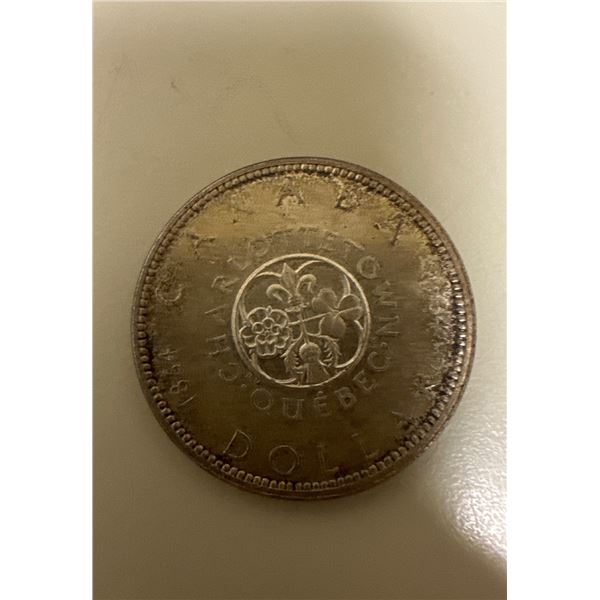 1864-1964 Canadian silver dollar