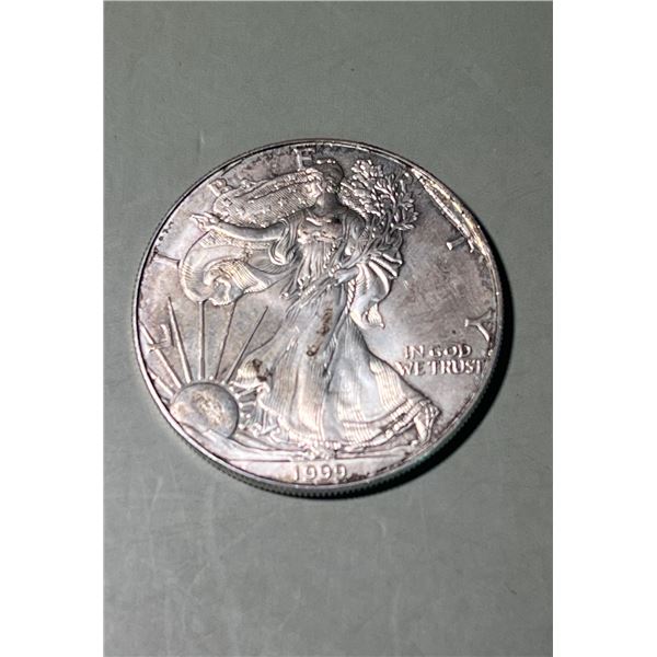 1999 $1 American 1oz, 0.999 Pure Silver Eagle Round.