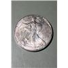 Image 1 : 1999 $1 American 1oz, 0.999 Pure Silver Eagle Round.