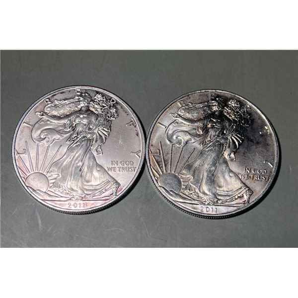 Pair of 2011 $1 American 1oz, 0.999 Pure Silver Eagle Rounds.
