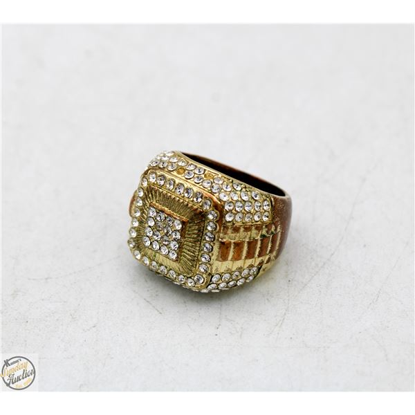HEAVILY JEWELED GOLD TONE RING - LARGE/HEAVY