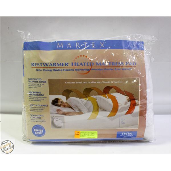 NEW IN PACKAGE TWIN HEATED MATTRESS PAD