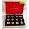 Image 1 : 12 VINTAGE KDAYS COINS IN WOOD CASE-ESTATE