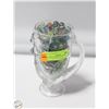 Image 1 : VEGAS TREASURE ISLAND MUG FULL OF MARBLES
