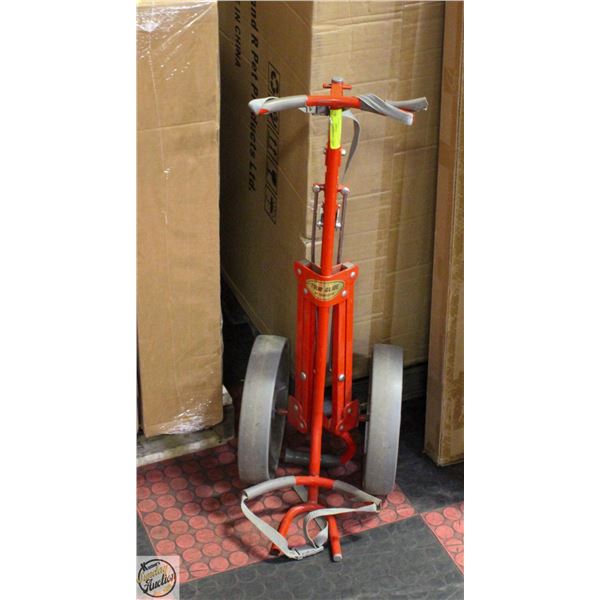 RED GOLF BAG CARRIER ON WHEELS