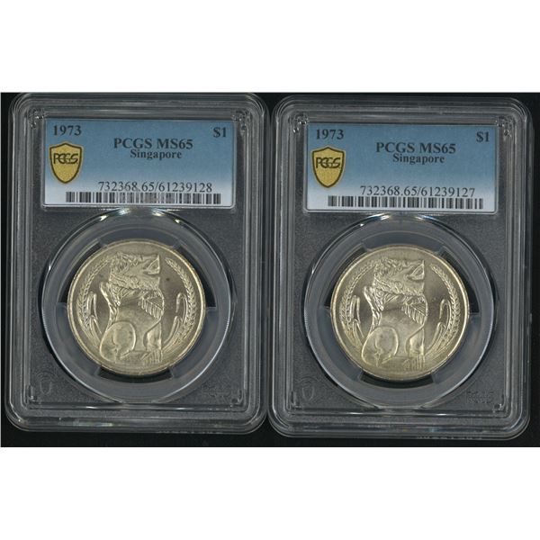 Singapore, 1973, lot of 2, $1. Both PCGS MS65. (61239127/128)