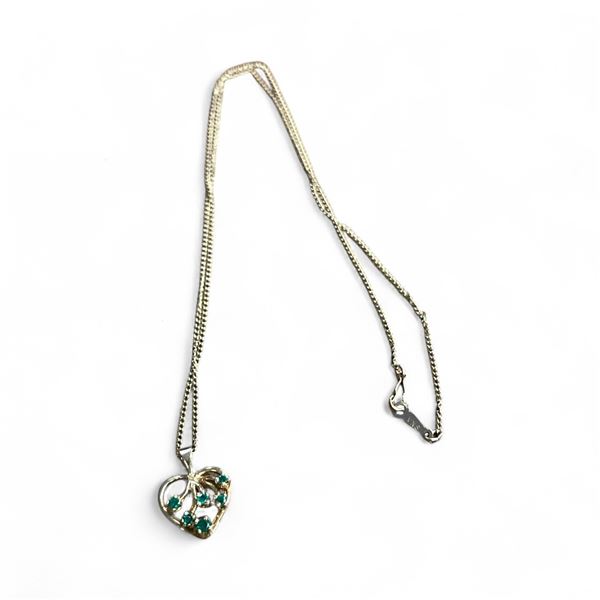 10 KT Gold 16" Necklace with Emerald Pendant - Total weight including gemstones: 2 grams.