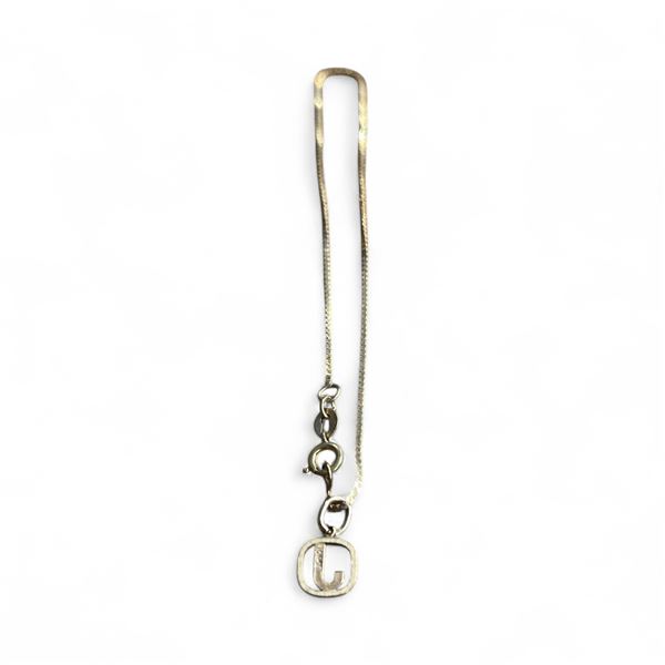 10 KT Gold 7.5" Bracelet with "J" Charm - Total weight: 1 gram.