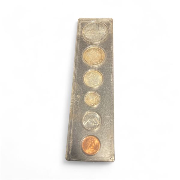 1967 Circulated Canadian 6 Coin Set in Holder - The 50¢ and $1 coins are .800 Silver, and the 25¢ an
