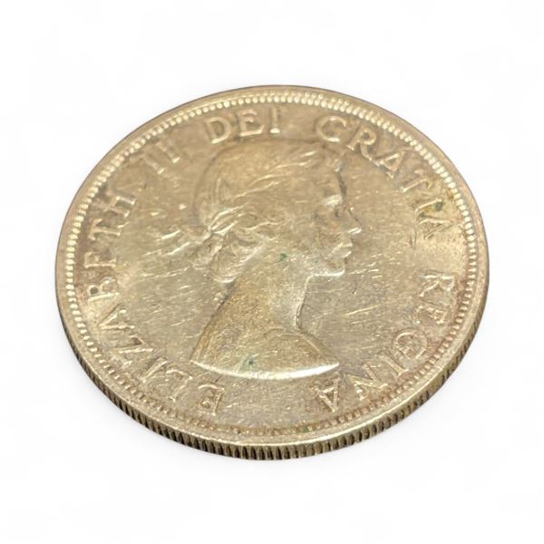 1958 Canadian Silver Totem  Death  Dollar - .800 Silver - Circulated