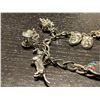 Image 2 : Sterling Silver Charm Bracelet with 7 Sterling Charms - Weight: 30.5 grams