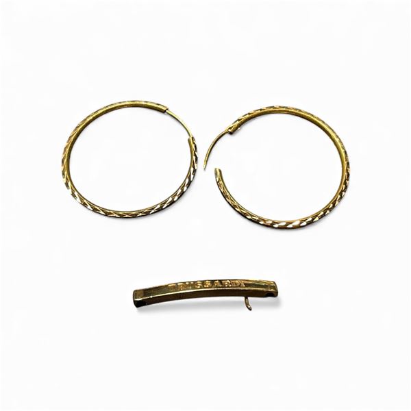 Pair of Gold Hoop Earrings and a Trussardi L Part - Said to be 18KT - Unstamped - Earrings are 1.25"