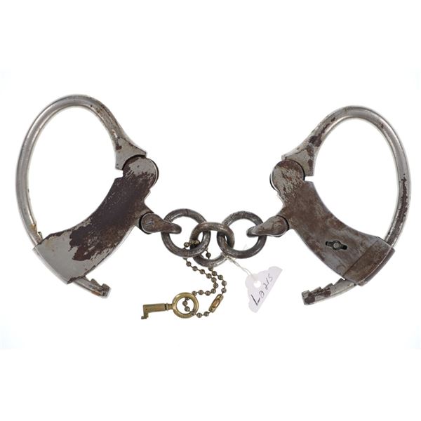 19th C Tombstone A.T LEO Stainless Steel Handcuffs
