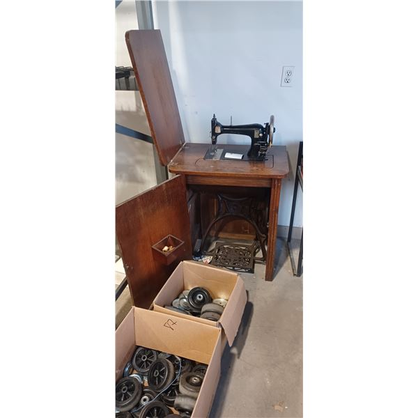 ANTIQUE TREADLE SEWING MACHINE AND CABINET FAIR CONDITION